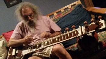 Klaus Weiland-Tuning sitar and preparing for recording tracks for Gilgamesh
