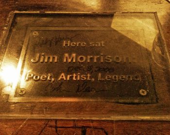 "Here Sat a Poet" The plaque memorializing the bar stool that Jim Morrison sat in on and off for over 3 years at Barney’s Beanery on Santa Monica Blvd. This plaque was placed on Jim Morrison’s birthday, December 8, 2008, and signed by Robby Krieger, Ray Manzarek and John Densmore at a party that night hosted by Jim Ladd.
