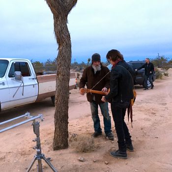 RICK SPRINGFIELD MAKING HIS VIDEO AND GETTING A GUITAR LESSON
