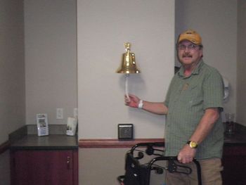Jack ringing the bell to denote the last radiation treatment -- this was before they knew that he had cancer in his knee
