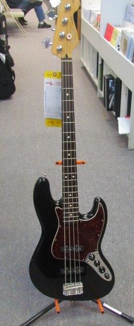 this fender jazz deluxe unfortunately wound up in a local thrift store and guess what? as i exited the store, minding my own business, next thing i know it's in my car and my pocket is $300 lighter. couldn't resist the great deal
