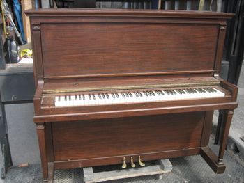 1928 Cable Nelson That had an older refinish job, was dull etc. We disassembled the entire piano, polished the keys, replaced missing parts, polished the brass, and applied 7 coats of semi gloss lacquer.
