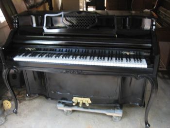 1964 Kimball Artist console after getting a new semi gloss ebony finish. Bench was recovered in black leather as well.

