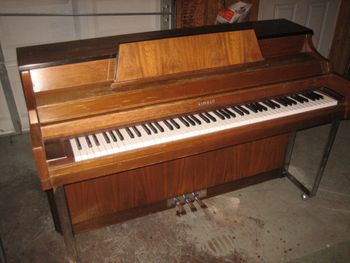 1976 Kimball Spinet as it came in, Had some veneer issues so we refinished it in black satin.
