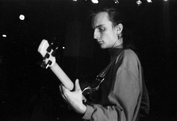 Steak-out: classic Andreas bass-playing pose, Beijing 1991
