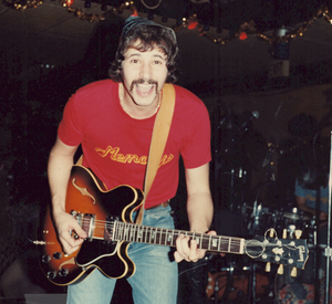 Me playing the Gibson ES-335 I wish I hadn't sold years ago