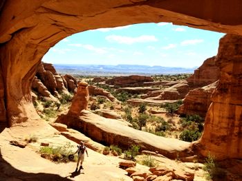 Playing in Tower Arch in Arches N.P.
