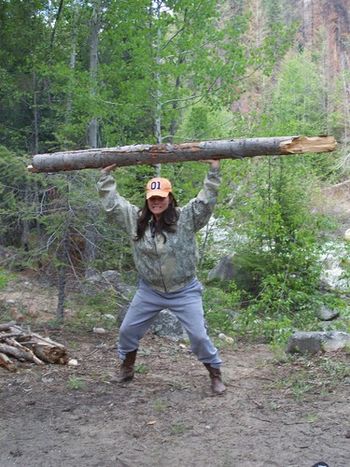 Chrissy out gathering firewood. Nice outfit by the way!
