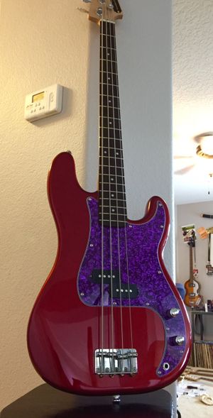 Red sSparkle P-Bass Deluxe with Purple "Pearloid" pick guard