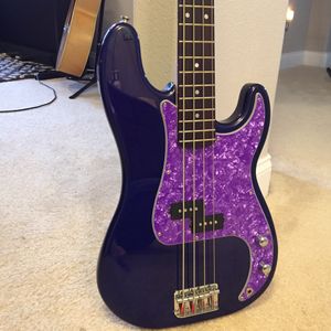Midnight Blue Fender Standard "P-Bass" with a Purple "Pearled" Pick Guard. 