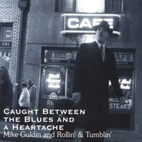 Caught Between the Blues and a Heartache by Mike Guldin and Rollin' & Tumblin'