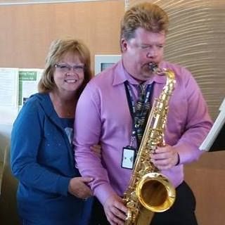 My mom sneakin' up behind me while I play for Nurses Day a VA Long Beach -
