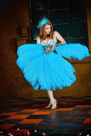 Red Snapper with blue feather fans in Dallas, photo by Lou O'Neal