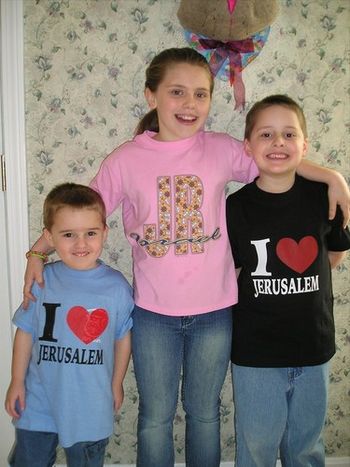 the east coast grandkids with their shirts from Jerusalem
