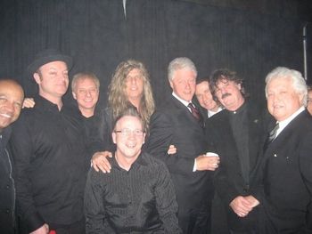 with President Clinton, John Travolta, Burton
