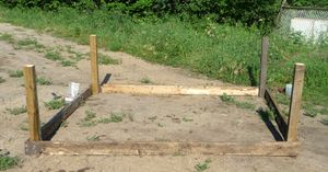 Chicken tractor uprights are attached