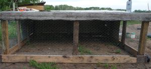 Front view of the DIY moveable chicken coop AKA chicken tractor