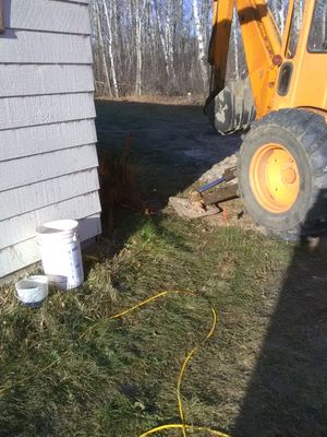 Well plumbing starts with well pump contractor digging the hole
