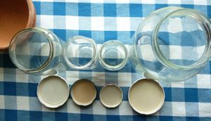 Photo of reusable glass jars and reusable canning lids
