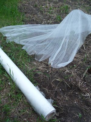 DIY floating row cover tunnel - cutting the floating row cover