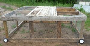 Attaching center section of metal roof to pastured poultry chicken tractor