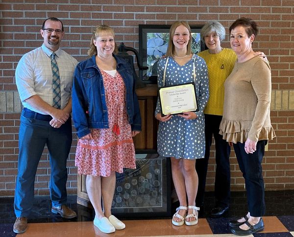 Laney Covey with art teacher Chris Woods, Jenny Covey, Karen Fremar and counselor Jeanne Camac