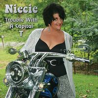 Trouble With a Capital T by Niecie