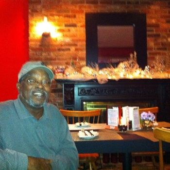 Bryant Edwards, congas, vox, relaxing before the gig, All American Grill, Dennis MA 12-22-11 Photo by Andy Diggs
