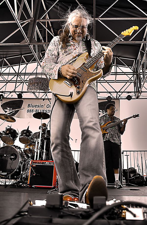 Mikey Capone performing live with the Larry McCray Band 2010. Photo by Marilyn Stringer