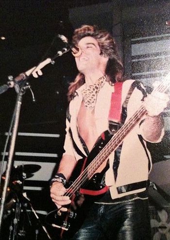 Gene O. performing at his record release party for his rock band, ADDICTION
