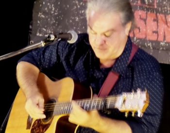 Peter Miller-Robinson performing March 2015
