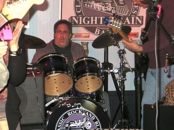RONNIE LAYIN' DOWN A GROOVE DISPLAYING THE NEW NIGHT TRAIN BASS DRUM LOGO AT DUDLEY'S, NEW ROCHELLE, NY - 11/2/13.
