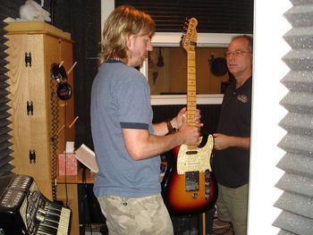 Travis Tritt lead guitarist Wendell Cox in studio getting ready to record some tracks for me.
