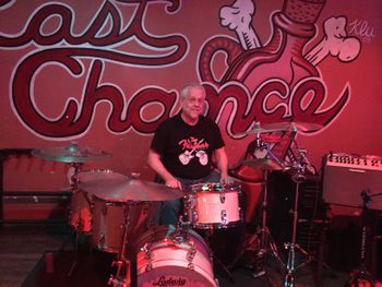 Last Chance...to get out from behind the drums.  Chas at Slim's (2018).
