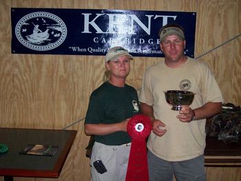 Angie receives the second place ribbon and silver engraved cup from Glenn Conney at the Delta Waterfowl Mid Atlantic Retriever Championship. Angie and Grace had a fantastic weekend at Feather Creek Farms in Greenville, NC which is where the event was held. The grounds were great and provided for some very challenging test.
