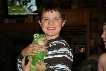Ethan and puppy in frog costume
