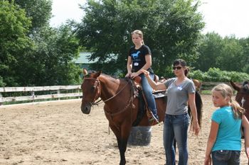 Coreen is teaching horsemanship techniques and safety while Faith and Faren demonstrate.....
