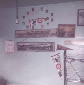 On the walls in the store was Chicago Cubs and WHite Sox pennants.
