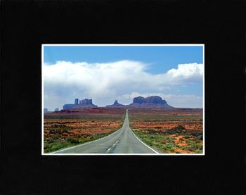 Monument Valley UT, the road is one in the Forrest Gump movie.
