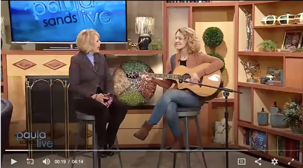 Click on the picture to see Melanie's recent performance on KWQC Davenport Iowa's Paula Sands Live show.