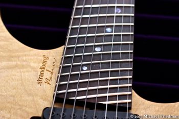 (02/24/15) This is a Strandberg Boden 8. This is one of the first production models that was made by Strictly 7. All my other Strandbergs are of the Washburn custom shop verity. I can definitely see why the switch was made. But with that this is still an amazing guitar. The body is a Flame Maple top over a Swamp Ash back. The neck and fretboard are Rosewood. The guitar was originally owned by the guitar player in Modern Day Babylon. He switched the pickups to Bare Knuckle Juggernauts. I added a set of Rosewood knobs. I wanted a higher end 8 string and this definitely fit the bill.

