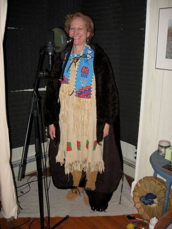 Leontine channeling the bear and star spirits' songs in shamanic costume
