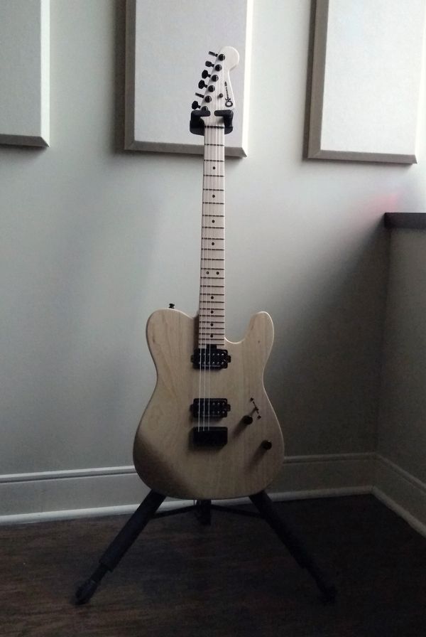 Here we have a Charvel Pro-Mod San Dimas HH (2 Humbuckers), HT (Hard Tail bridge), M (Maple Neck), Ash (what a name, huh?). Stripped down, basic, beautiful and ready to hit it! Generally, this is tuned to an open G. As things evolve, I've started messing more with alternate tunings. 