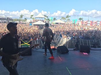 Kiva P.O.V. onstage backing Shaggy at KAABOO Festival, Cayman Islands
