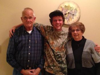 Tyler with Tommy's parents, Raloh and Glen Doris Buchannan.
